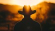 Silhouette of a cowboy in a field with sun backlight, AI-generated.