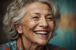 Ausgelassene Freude einer lebenserfahrenen Seniorin, umgeben von einem farbenfrohen Hintergrund - Glücklichsein im reifen Alter