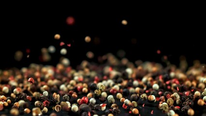 Sticker - Super slow motion peppercorn falls. High quality FullHD footage