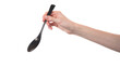 Hand Holding Black Spoon and Another Black Spoon