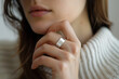 Technology concept - beautiful woman wears a smart ring for better health tracking