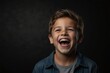 young american child boy on plain bright black background laughing hysterically looking at camera background banner template ad marketing concept from Generative AI