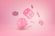 Floating pink dice and casino chips