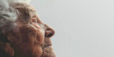 Fototapeta  - A gentle and poignant side profile of an elderly woman's face, emphasizing the beauty of age and the depth of life's experiences.