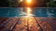 Empty brown wet wood surface in front of a blurred swimming pool. A tropical summer background used for product display.
