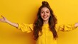 © Naknakhone - Photo of excited positive lady dressed cowskin top comparing arms empty space isolated yellow color background. copy space for text.