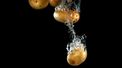 Poster - Super slow motion Potato falls under water. High quality FullHD footage