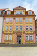 Front facade of a colorful hous on the Untermarkt square in Muhlhausen, Germany