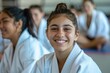 © Attasit - Portrait of happy students in a judo class at the gym