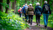 © Jezper - Elderly people strolling in park. Sunny summer day. Active retired seniors walking in green forest