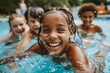 group of diverse children in swimming pool with inflatable ring circles, smiling kids wearing swimwear at outdoor summer pool party portrait