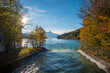 Rissbachstollen streaming into lake Walchensee, autumnal landscape bavaria
