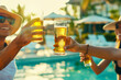 Friends celebrating the start of their vacation in the courtyard by the pool of an oceanfront hotel, joyfully raising their glasses of beer, youth party concept or cruise invitation banner