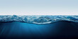 © Studio Light & Shade - Blue water and clear sky. Cross-section of deep ocean with waves on the surface. Rays of light illuminating clear dark blue water. Marine landscape. Copy space.
