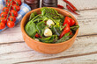 Mix salad with mozzarella and tomato