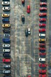 A diverse array of vehicles parked in a busy lot. Perfect for automotive or transportation concepts