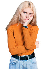 Canvas Print - Young caucasian woman wearing casual clothes thinking looking tired and bored with depression problems with crossed arms.