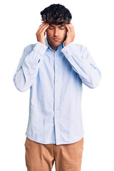 Sticker - Young hispanic man wearing casual shirt with hand on head for pain in head because stress. suffering migraine.