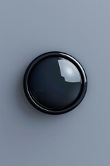 Poster - A black button on a gray surface, perfect for tech or design projects