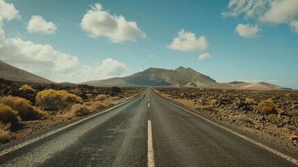 Aufkleber - An empty road in the middle of the desert, perfect for travel brochures or desert-themed websites