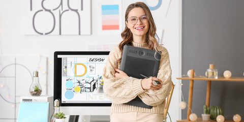 Wall Mural - Portrait of female interior designer in office