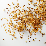 Fototapeta  - Golden confetti scattered on a white background