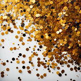 Fototapeta  - Golden confetti scattered on a shiny surface