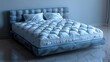 A stylish bed with a blue velvet headboard and matching pillows. Perfect for interior design projects