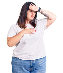 Poster - Young plus size woman wearing casual clothes touching forehead for illness and fever, flu and cold, virus sick