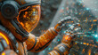 A man in an orange spacesuit is touching a computer screen