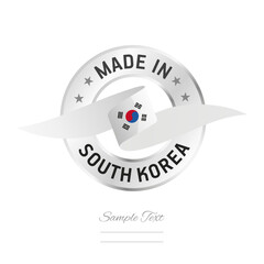 Sticker - Made in South Korea. South Korea flag ribbon with circle silver ring seal stamp icon. South Korea sign label vector isolated on white background