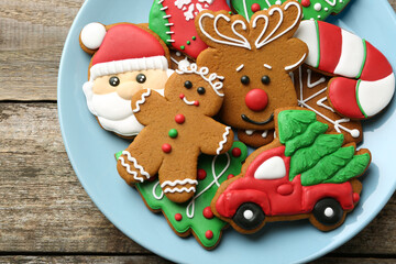 Wall Mural - Different tasty Christmas cookies on wooden table, top view. Space for text