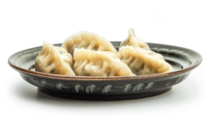 Canvas Print - Dumplings in bowl on plate on table