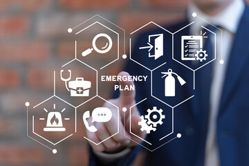 Wall Mural - Business man using virtual touch screen clicks text: EMERGENCY PLAN. Business emergency plan concept. Checklist to do in disaster, continue business and build resilience concept. Smart emergency plan.