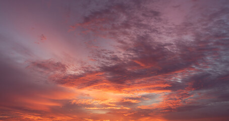 Wall Mural - Panoramic view of sunset golden and blue sky nature background.
Colorful dramatic sky with cloud at sunset.Sky background.Sky with clouds at sunset.