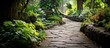 Tranquil stone path flanked by verdant plants and trees in a natural setting, creating a peaceful ambiance
