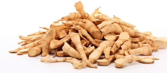 Wall Mural - Pile of dried ginger roots shown in detail on a clean white background