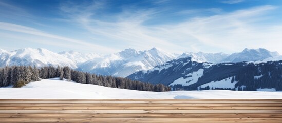 Sticker - Deck made of wood offers a view of snow-covered peaks under a clear blue sky