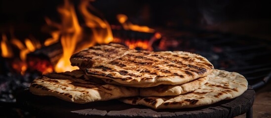 Sticker - Pita bread being grilled up close, showcasing the cooking process and texture