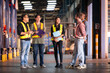 © Wosunan - A group of warehouse employees, Inspecting products on warehouse shelves before they are sent to retailer