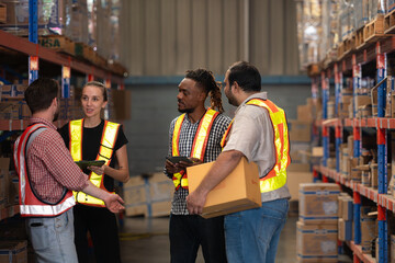 Wall Mural - A group of warehouse employees, Inspecting products on warehouse shelves before they are sent to retailer