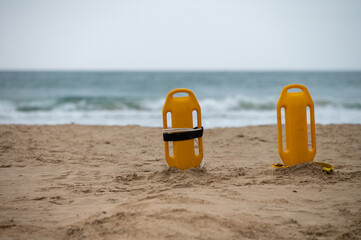 Poster - Lifesavers buoy seen on empty beach