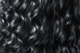 Fototapeta Lawenda - Close-Up of Dark Curly Hair Texture Against a Neutral Background