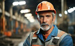 Portrait of Caucasian American steel worker in a factory.