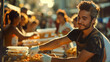 A handsome volunteer with messy hair and a black t-shirt. Give food to people, Surrounded by happy people, sunlight, bokeh