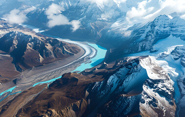 Aerial View of a Mountain with Snow and Blue River