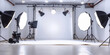 © Planetz - photo studio with lighting and chair, Interior of modern photo studi,   photography studio with white walls, cameras and lighting equipment set up in the background.