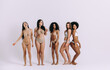 © oneinchpunch - Group of women with different body and ethnicity posing together to show the woman power and strength. Curvy and skinny kind of female body concept