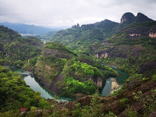 Wall Mural - Beautiful nature view of the Wuyi Shanmai Mountain range in China under a blue sky