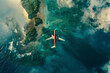 An airplane flying over the ocean with a tropical island